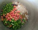 A picture of step 3 of Veg Pulav with Fruit Raita.