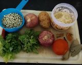 A picture of step 1 of Aloo Matar Pulav.