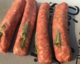 Une image de l'étape 3 de Saucisses de Toulouse grillées aux tomates,romarin et épices.
