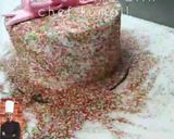 A picture of step 5 of Bow on top full cover sprinkles cake 🎀.