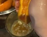 Hình bước làm 3 của món Vào bếp cùng con: nước cam vắt Măng Đen