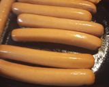 A picture of step 3 of Hotdogs and Sauerkraut cooked in Beef Stock. With an option.