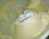 A picture of step 2 of Drips buttercream icing cake.