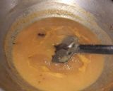 A picture of step 3 of Veg clear soup with sliced boiled egg.