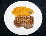 Foto del paso 7 de la receta: CHULETAS DE CERDO GRILLADAS AL COMINO, PURE DE ZAPALLO CON PIMENTON ROJO