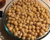 A picture of step 2 of California Farm Goat Confit with Garbanzo Beans.