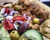 A picture of step 3 of Greek Pork Souvlaki with Greek Salad and Flatbread.