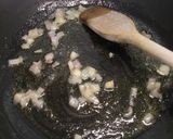 A picture of step 2 of Rosemary and pancetta risotto.