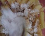 A picture of step 3 of Kfc style chicken garlic fries.