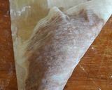 A picture of step 6 of Spicy beef triangles.