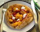 A picture of step 7 of paratha pizza homemade.