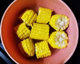 A picture of step 1 of Cheesy Masala Sweet corn.