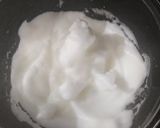 A picture of step 2 of Snow Ball Custard Pudding.