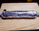 A picture of step 7 of Dates and Dry Fruits Roll.