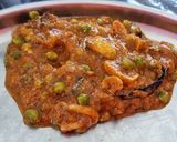 A picture of step 6 of Cashew matar masala.
