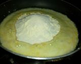 A picture of step 2 of Besan suji burfi.