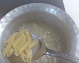 A picture of step 1 of Pink creamy pasta.