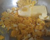 A picture of step 4 of Mango Blondie Bars with M&Ms.
