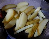 A picture of step 2 of Garlic Potato Wedges.