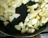 A picture of step 3 of Dahi Aloo.