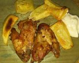 Foto del paso 6 de la receta: Alitas de pollo con papas al horno😋😋😋😋