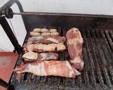Foto del paso 7 de la receta: Asado, pechito y bondiola de cerdo a la parrilla saborizados