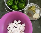 A picture of step 3 of Punjabi Paneer stuffed Capsicum in Red Gravy.