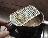 A picture of step 3 of Herbal Tulsi tea.