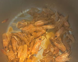 Foto del paso 1 de la receta: Fideuá de langostinos y pota