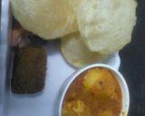 A picture of step 10 of Kashmiri Dum Potato.