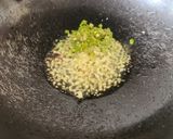 A picture of step 2 of Double Tadka Lasooni Palak Yellow Moongdal - Dhaba-Style.