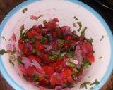 A picture of step 2 of Eggs, smokies with kachumbari.