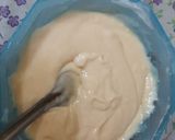 A picture of step 2 of Holi special Vanilla colourful cake.