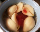 Foto del paso 9 de la receta: Peras confitadas en almibiar de fresas y canela