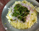A picture of step 2 of Aloo pitika.