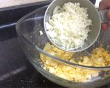 A picture of step 5 of Egg-cheese salad in bread cups.
