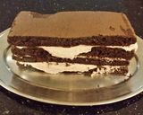 A picture of step 22 of Chocolate Layer Torte with Coconut Cream Filling and Frosting.