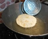 A picture of step 13 of Dal puri.