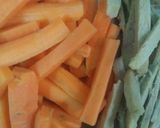 A picture of step 1 of Stir fry Carrot pickle with ginger.