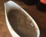 A picture of step 6 of Sticky red wine, rosemary and thyme gravy.