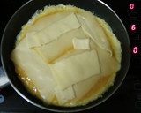 Foto del paso 5 de la receta: 🍳Tortilla de patata con jamón y queso
