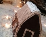 A picture of step 15 of Snow village cake.