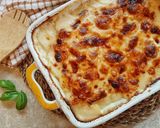 Foto del passaggio 4 della ricetta Parmigiana di patate e speck