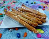 A picture of step 6 of Bosomat or Egyptian Breadsticks with Sesame Seeds.