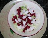 A picture of step 3 of Cabbage Beet and Raddish Salad.