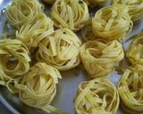 A picture of step 1 of Futticcine Red Sauce Pasta.