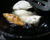 A picture of step 4 of Bihur guror nariyal pitha.