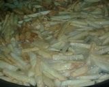 Foto del paso 2 de la receta: Milanesas con fritas al disco