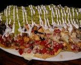 Foto del paso 6 de la receta: Nachos de pollo con tortilla