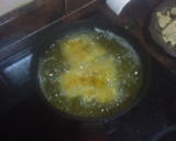 Foto del paso 4 de la receta: Tupper de merluza empanada y frita con papas cocidas